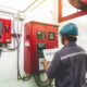 Technician servicing a fire pump system